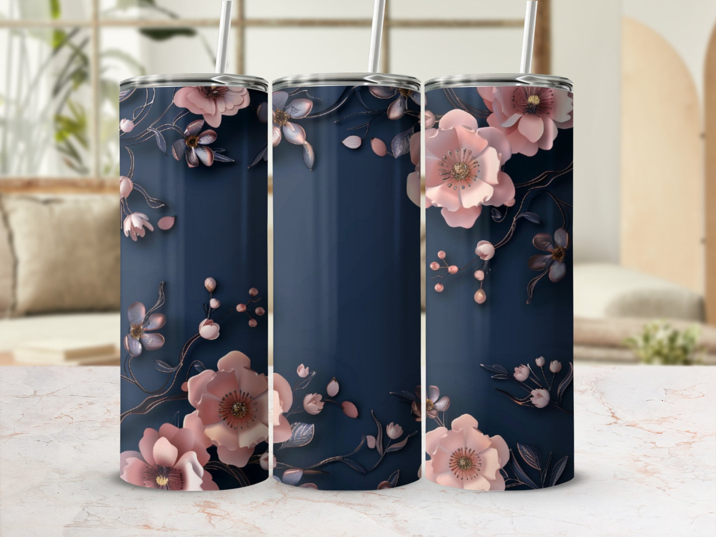 Navy blue tumbler with delicate pink floral design and metallic accents.