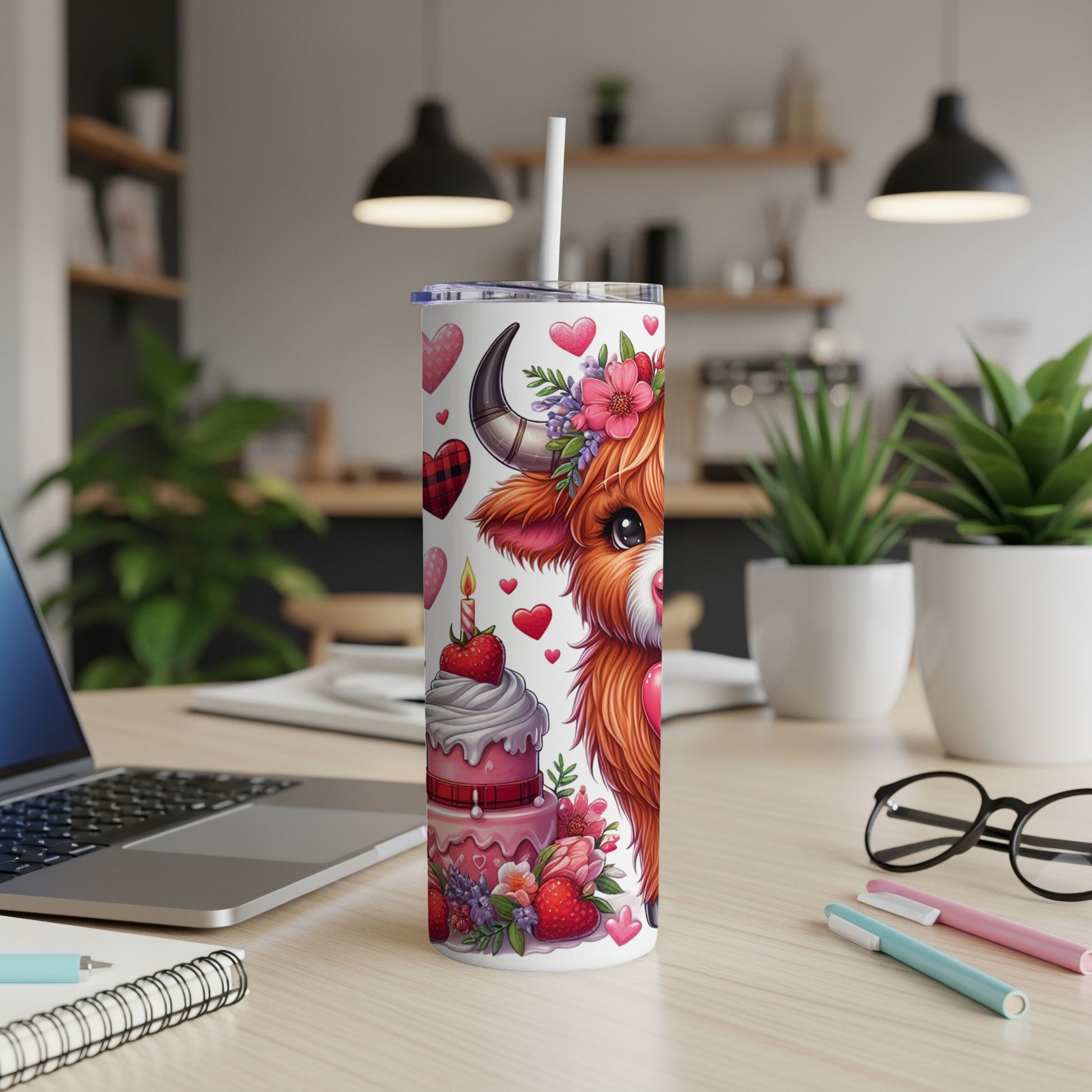 Pink and white cow tumbler with hearts, flowers, and a birthday cake.