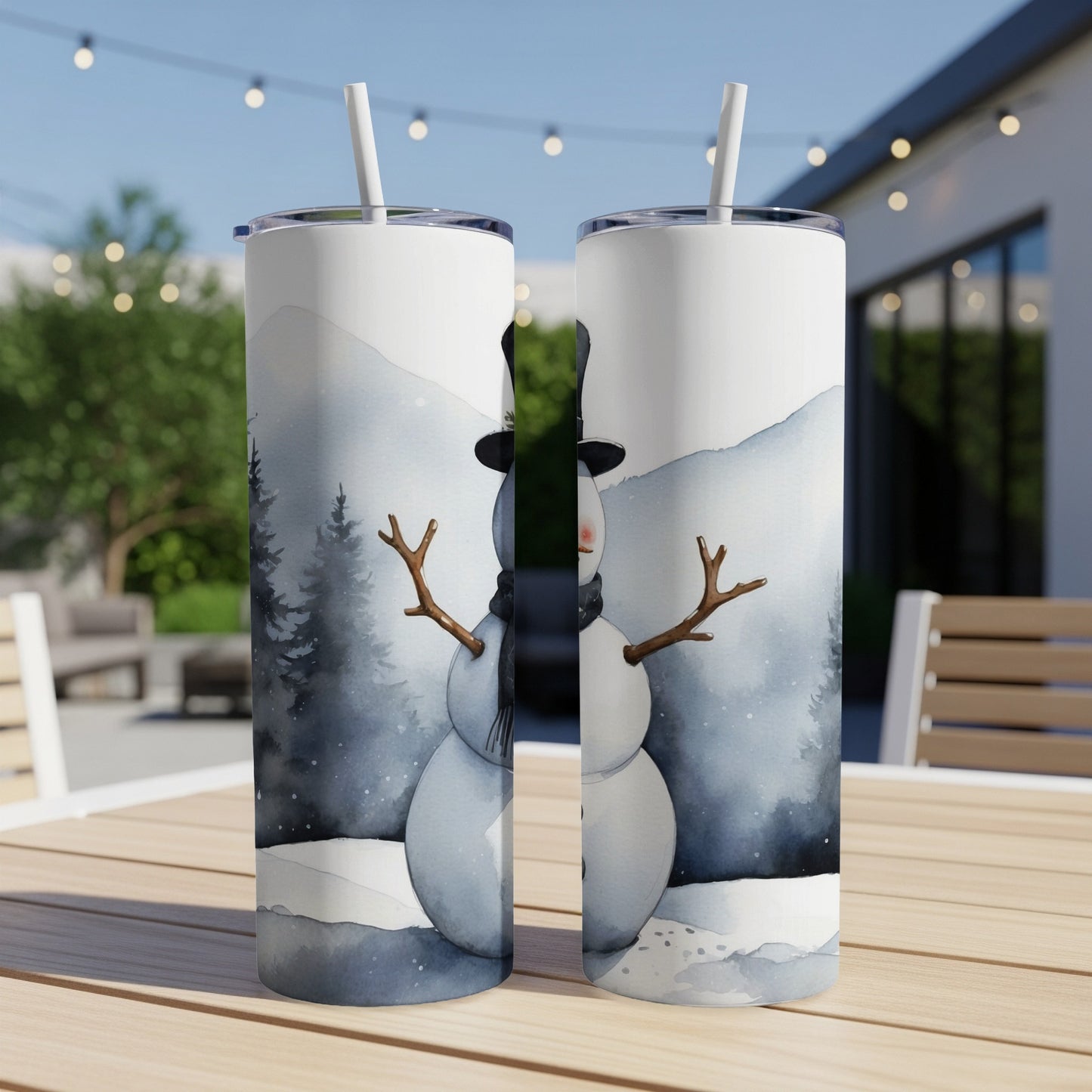 Snowman tumbler with black hat and scarf, winter landscape background.