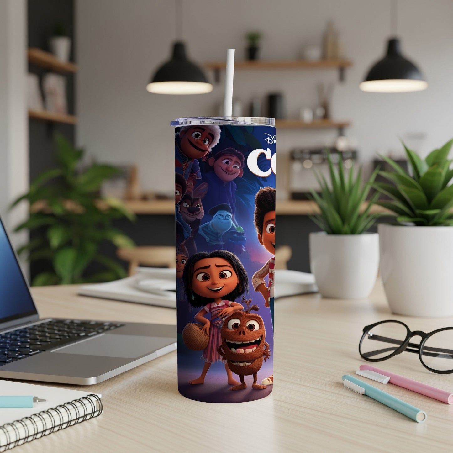 Encanto movie characters on a purple tumbler with a straw.