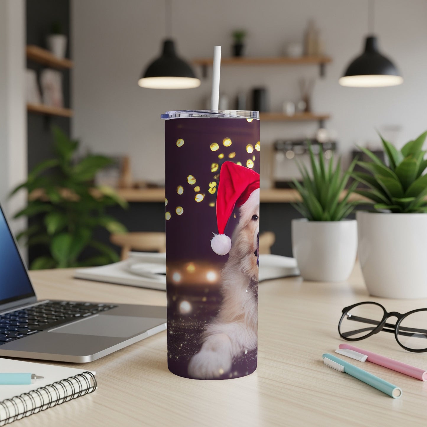 Golden retriever wearing a Santa hat on a purple tumbler with bokeh lights.