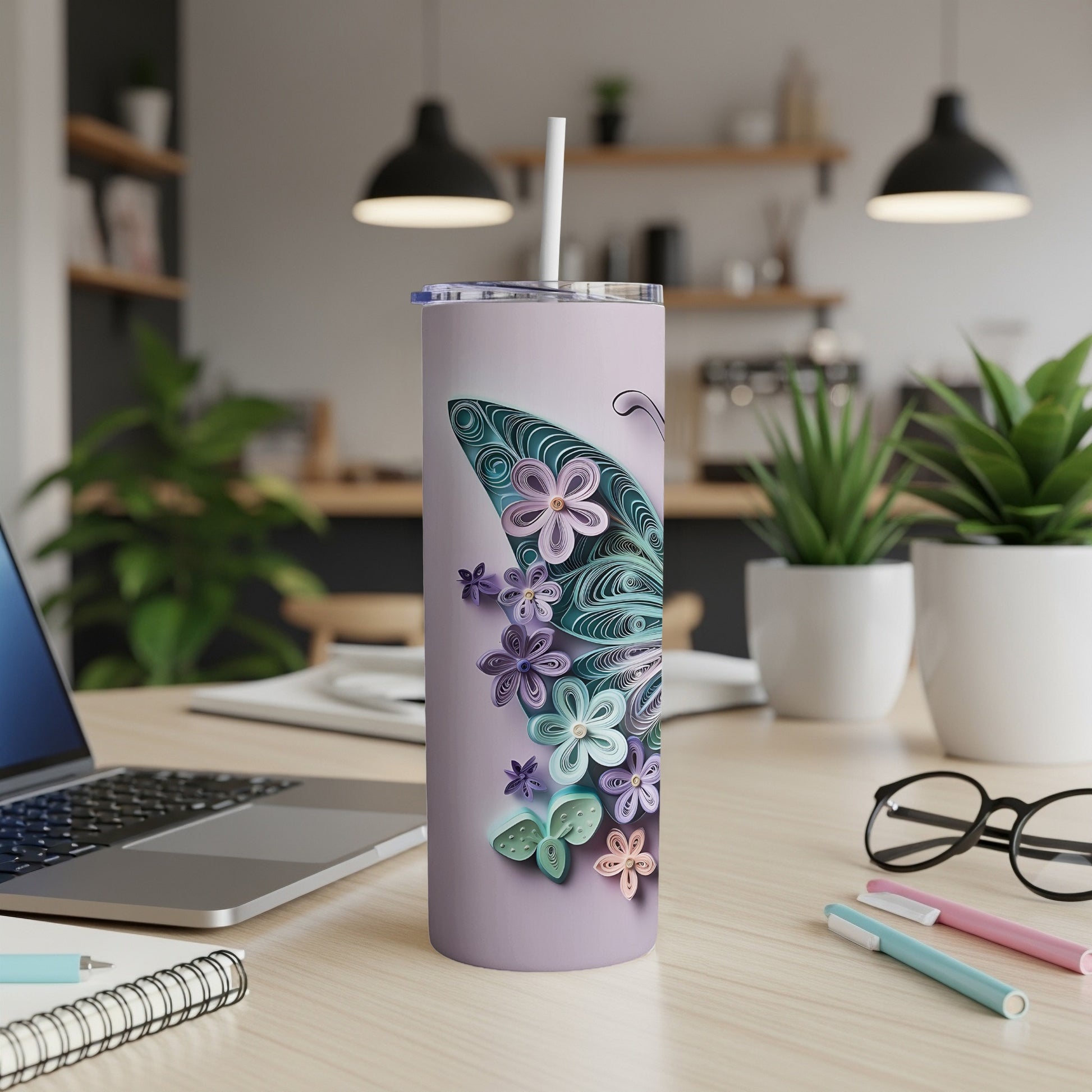 Purple tumbler with intricate quilled butterfly and flower design.