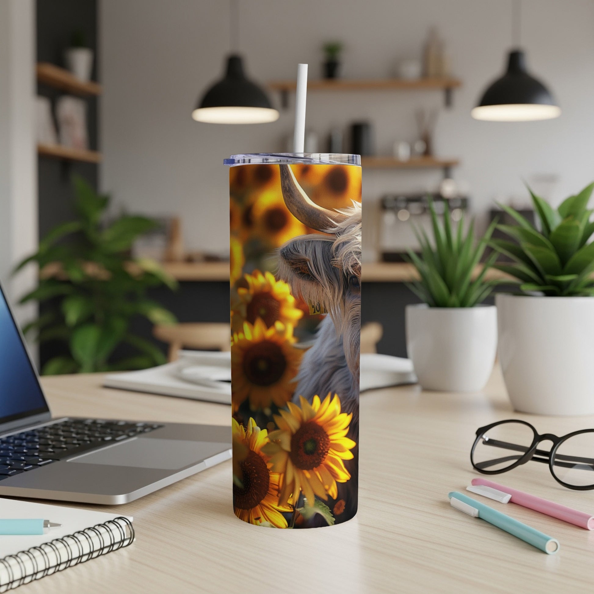 Highland cow and sunflowers on a skinny tumbler.