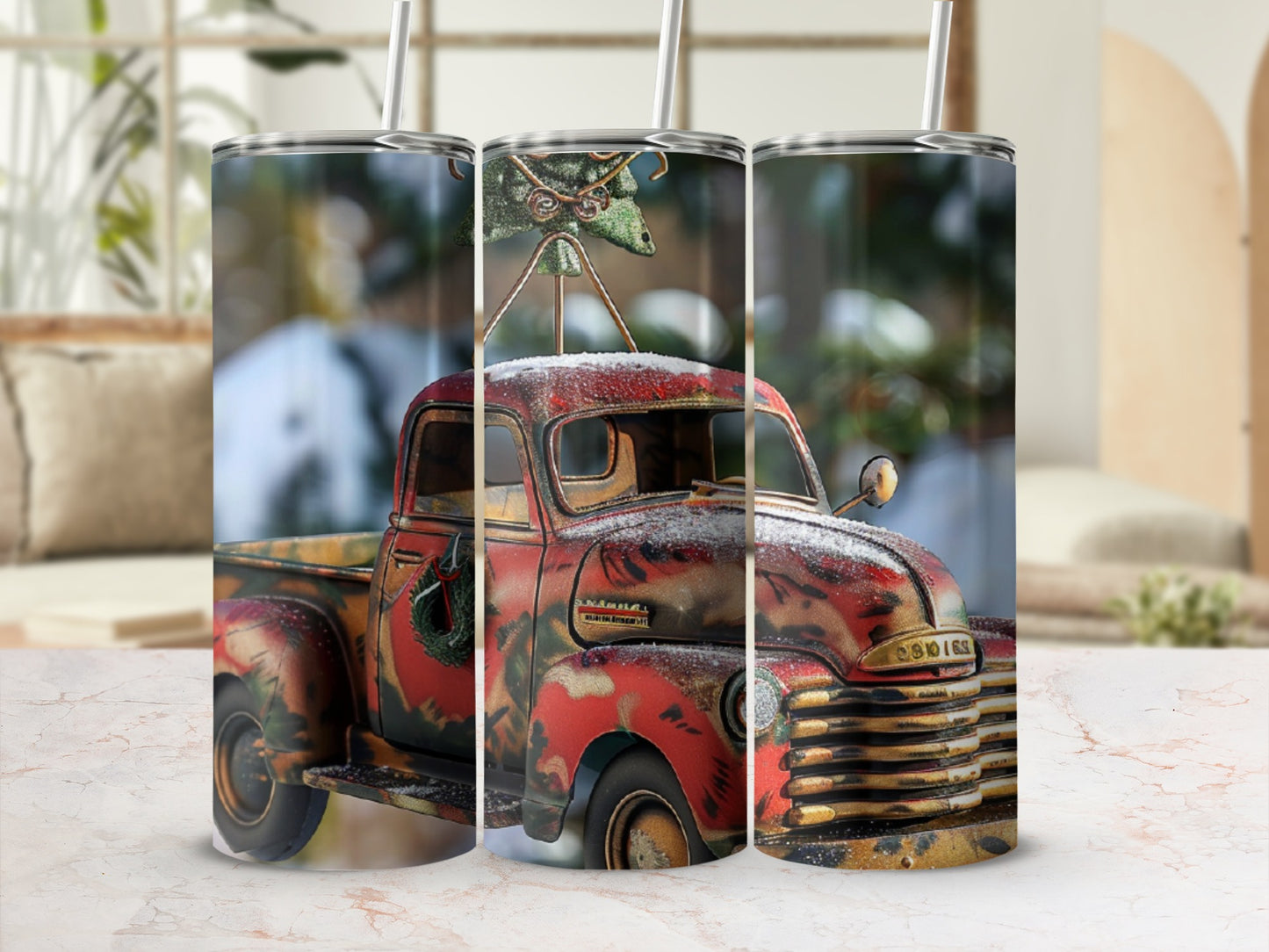 Red vintage truck with wreath on a marbled surface.