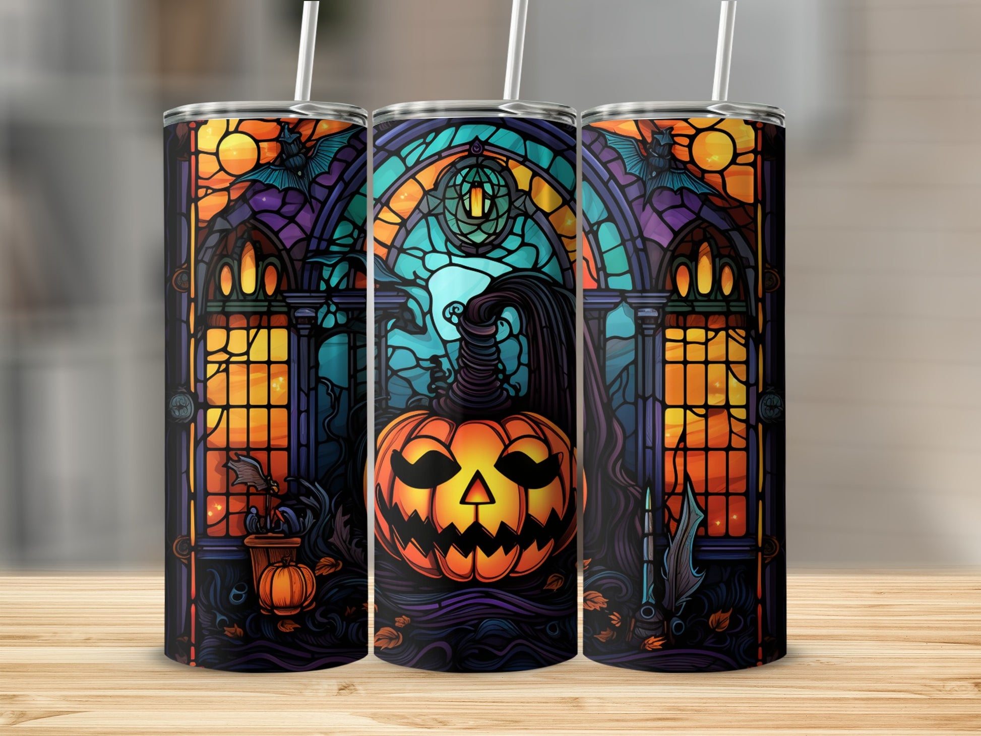 Stained glass tumbler featuring a jack-o'-lantern, witch hat, and bats.