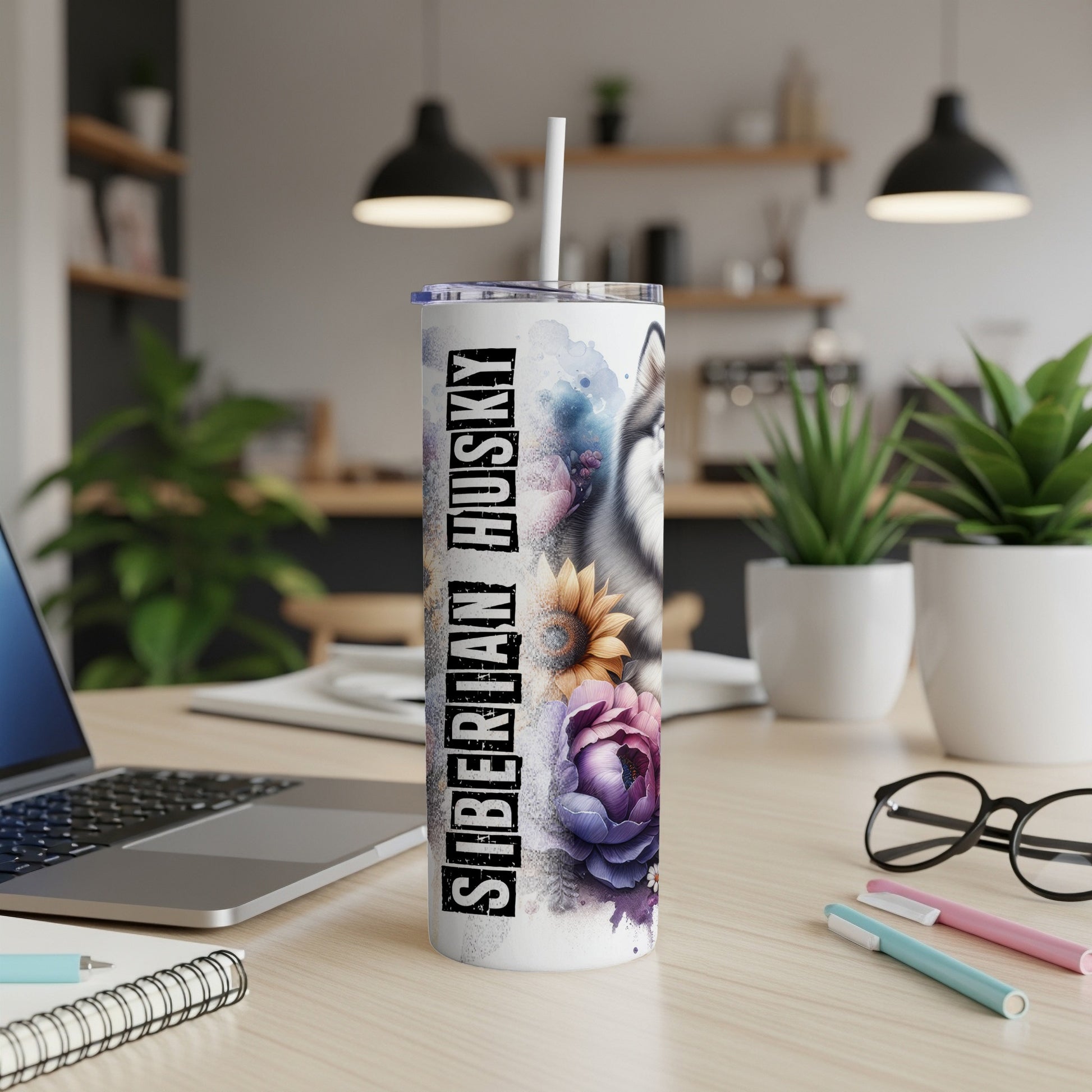 Siberian Husky tumbler with floral designs and a white straw.