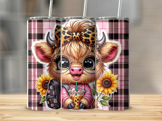 Cow with glasses and leopard bow holding bubble tea, plaid background.