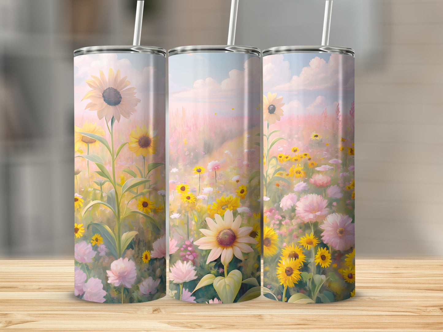 Three tumblers with a pastel floral meadow and sunflower design.
