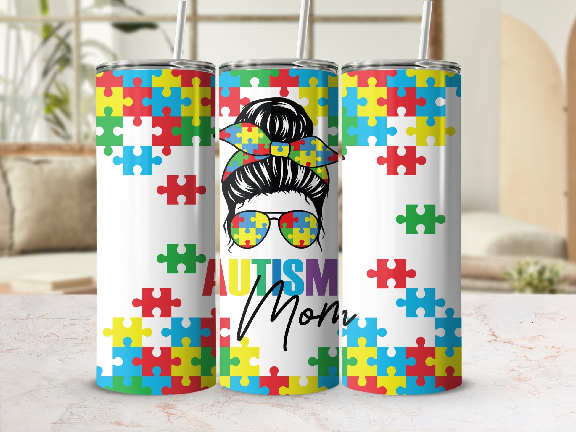 Autism mom tumbler with puzzle piece pattern and colorful sunglasses.