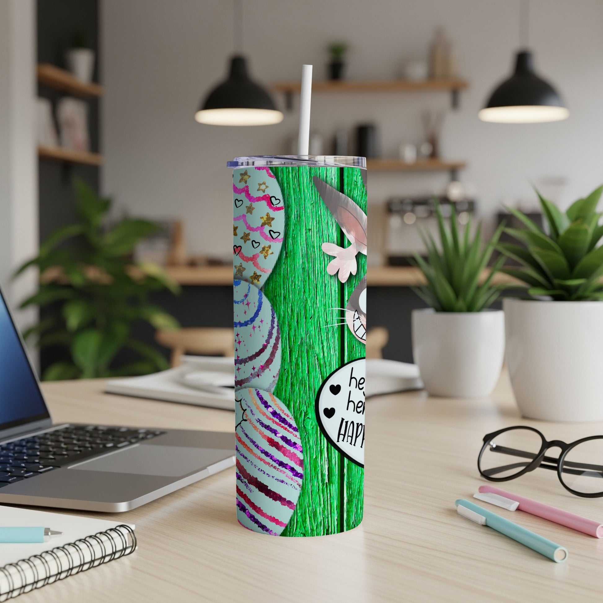 Green wood tumbler with colorful Easter eggs and rabbit ears, "Happy Easter" text.