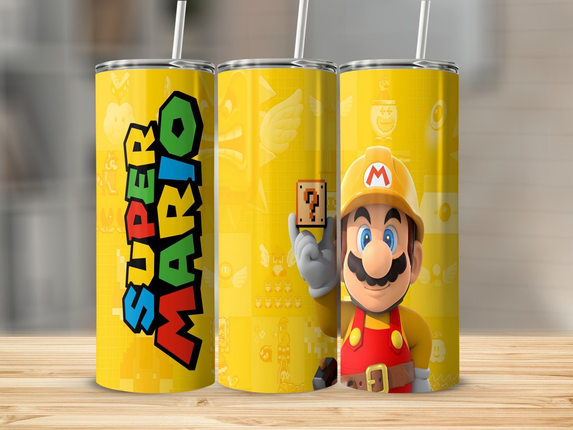 Mario holding a question mark block on a yellow tumbler with Super Mario lettering.