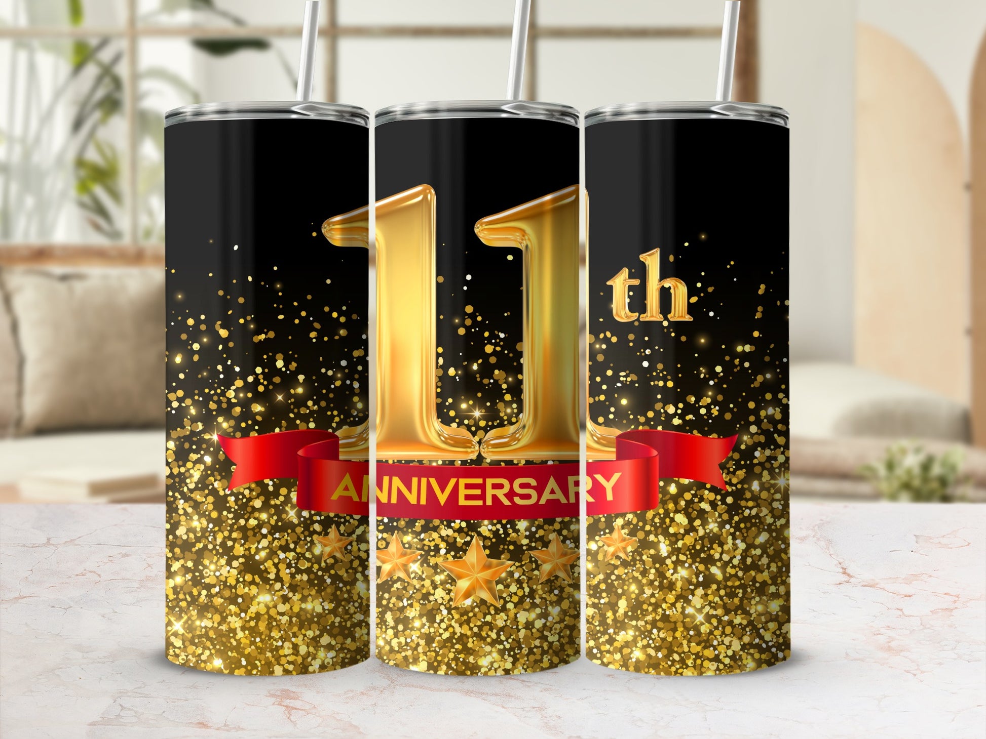 Black tumbler with "11th ANNIVERSARY" on a red ribbon with gold stars and glitter.