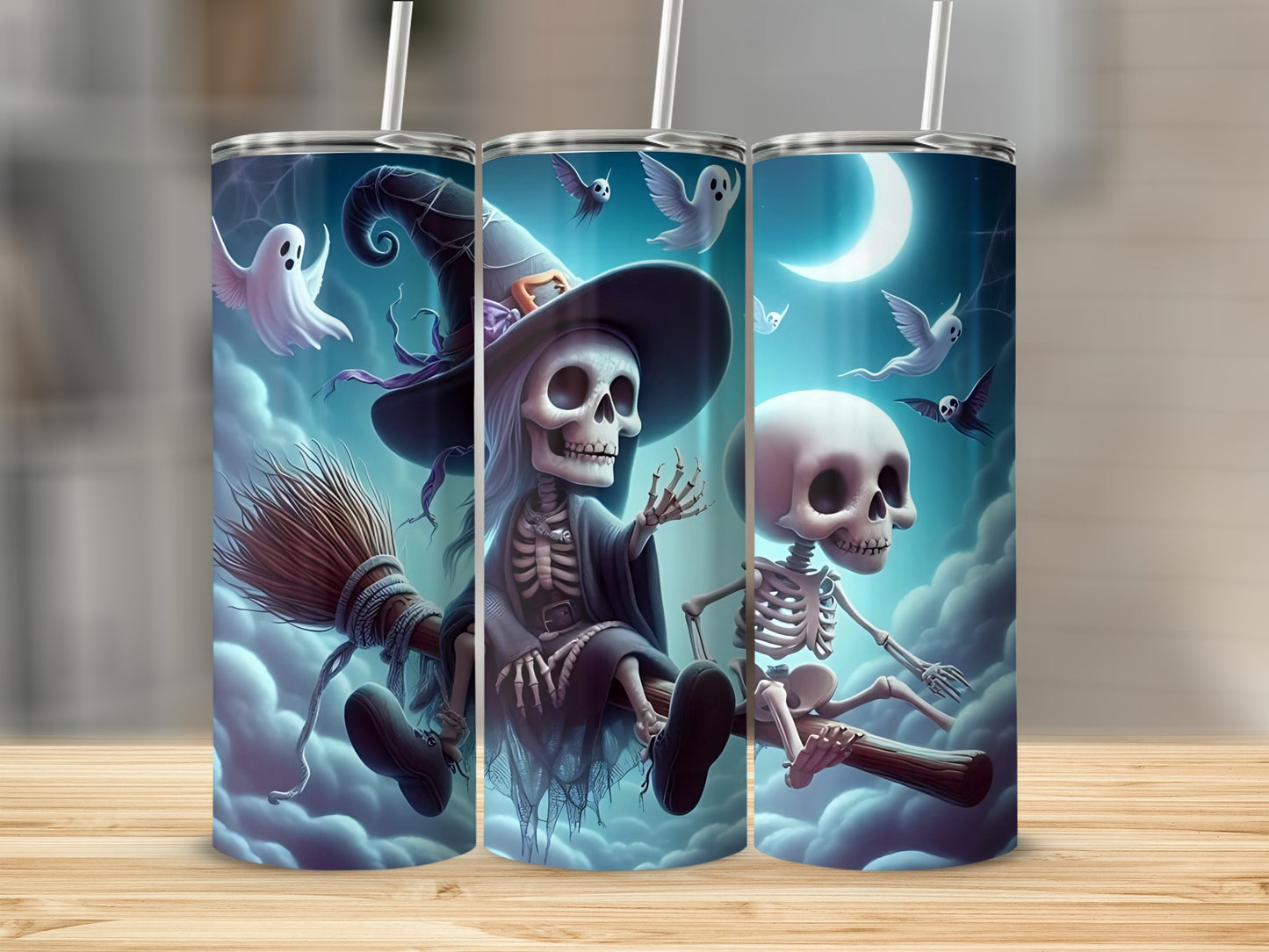 Halloween tumblers with skeletons, ghosts, and a crescent moon design.