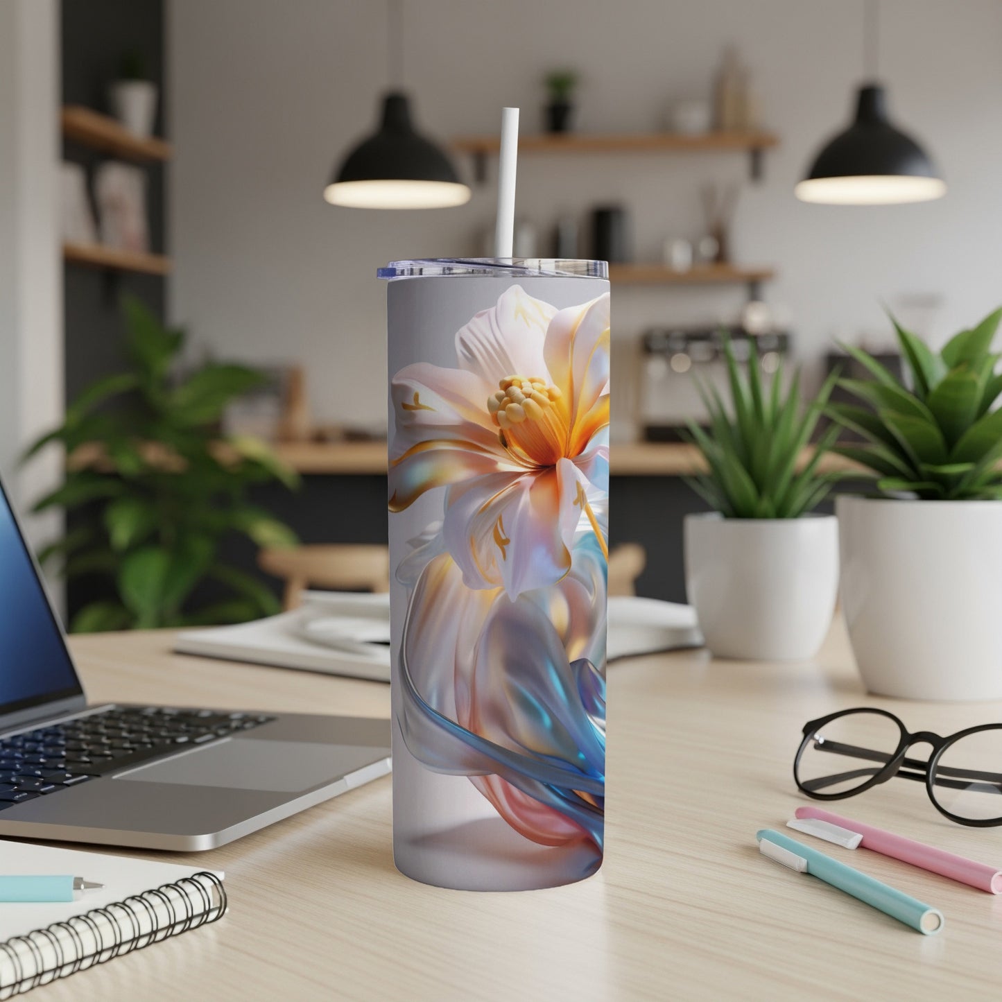 Tall, slender tumbler with a close-up floral design and a white straw.