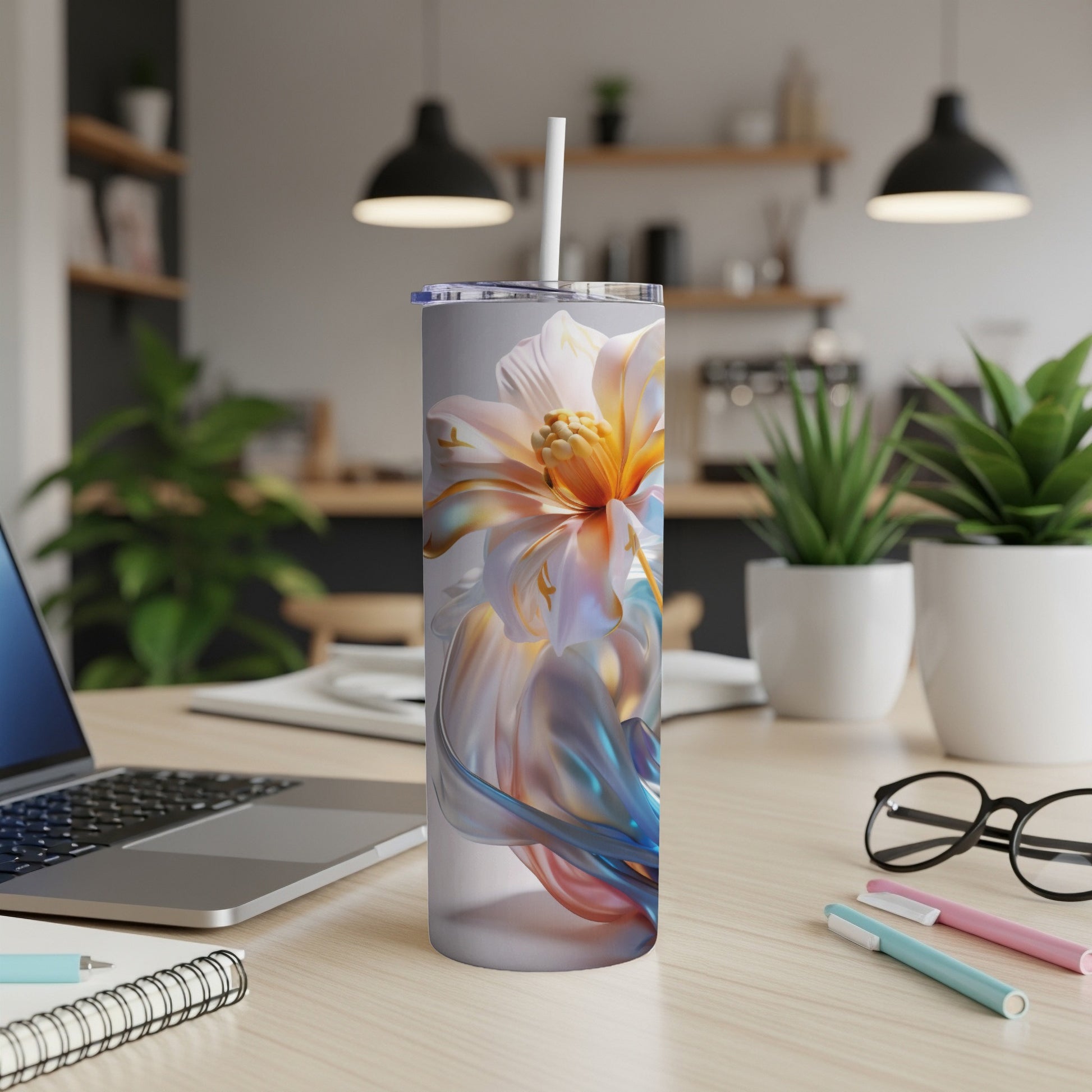 Tall, slender tumbler with a close-up floral design and a white straw.