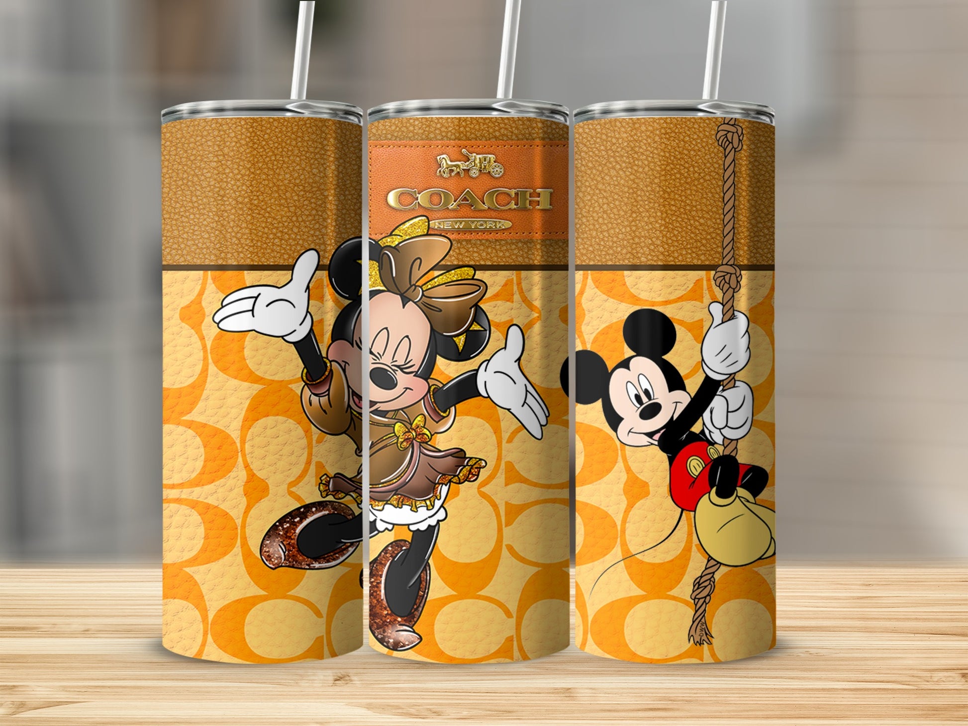 Minnie Mouse and Mickey Mouse on tumblers with Coach logo and tan pattern.