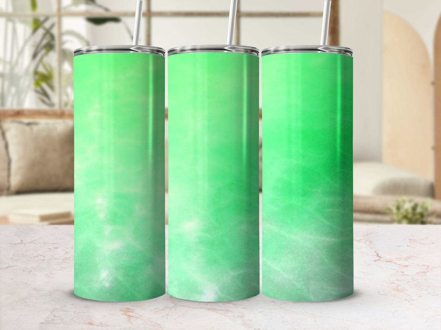 Three green gradient tumblers with white abstract pattern.