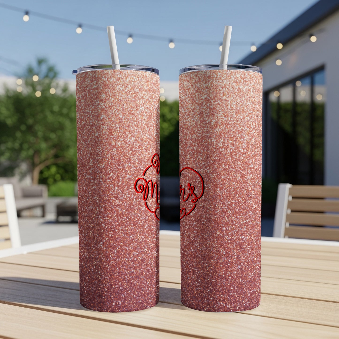 Rose gold glitter tumbler with "Mom" in cursive lettering.