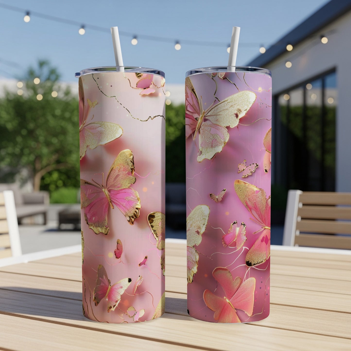 Pink and gold butterflies on a gradient background tumbler.