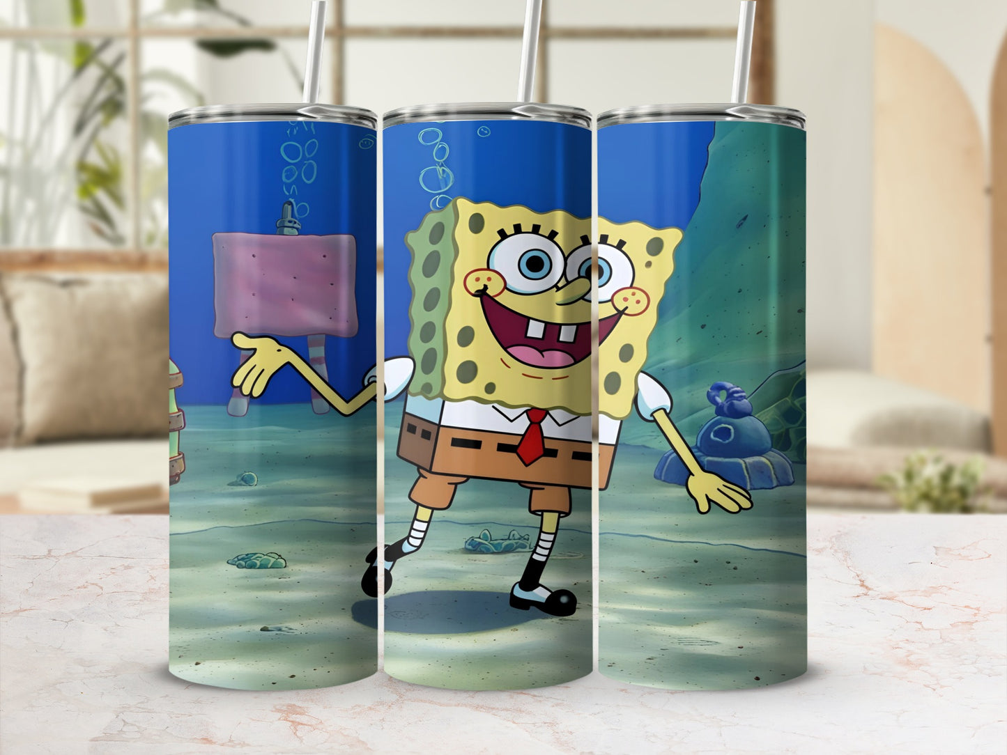 SpongeBob SquarePants on a blue tumbler with underwater background.