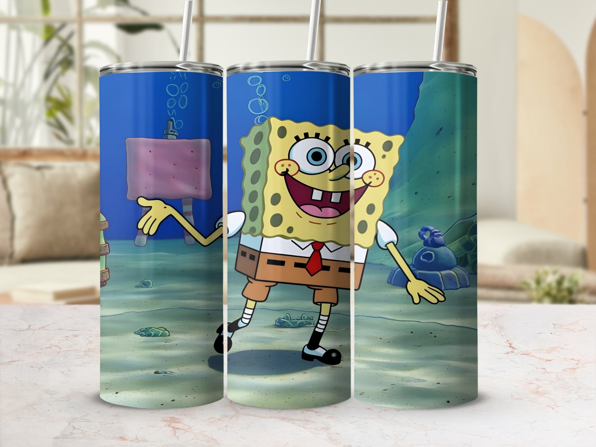 SpongeBob SquarePants on a blue tumbler with underwater background.