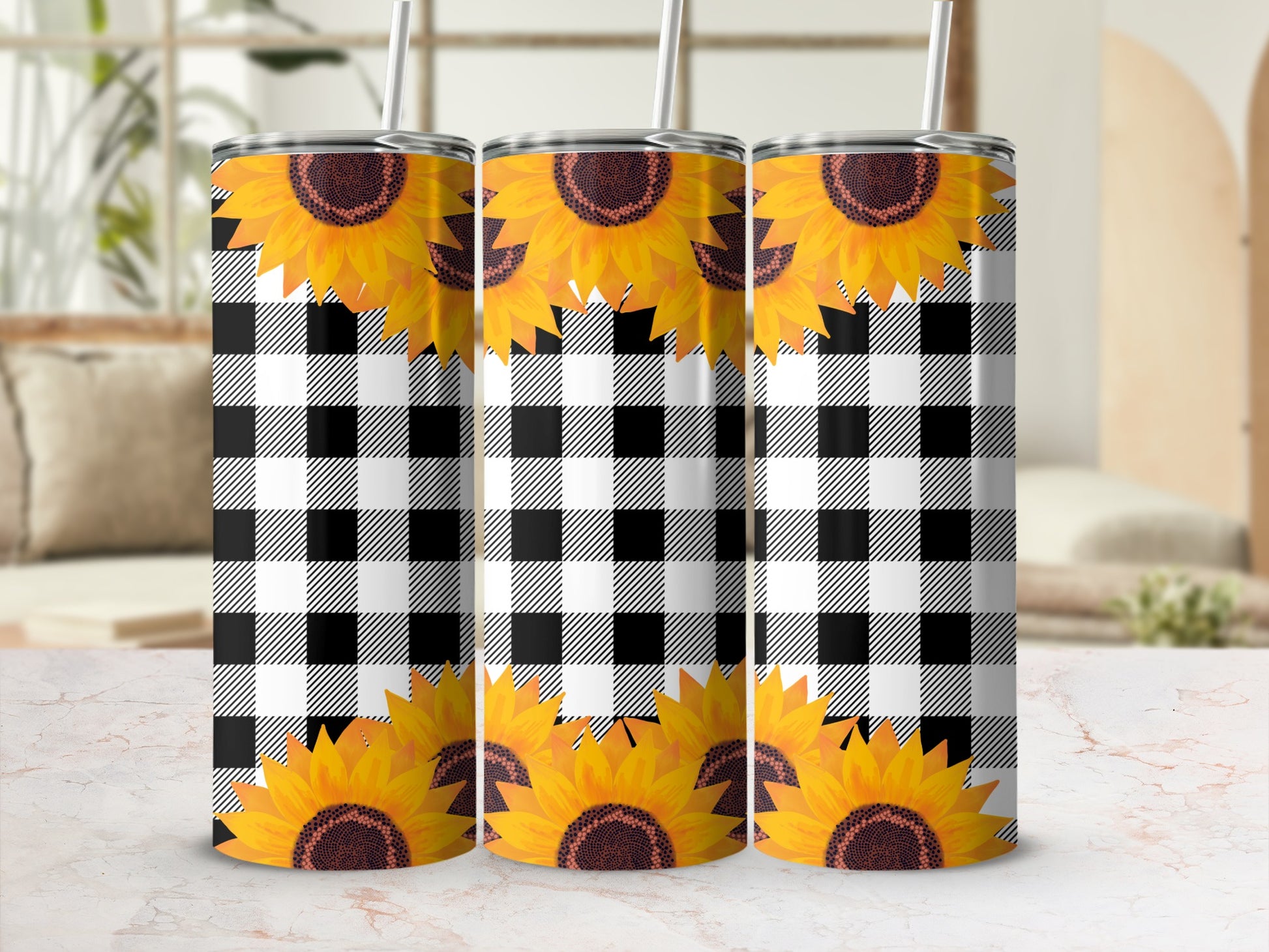 Three tumblers with sunflowers and buffalo plaid pattern.