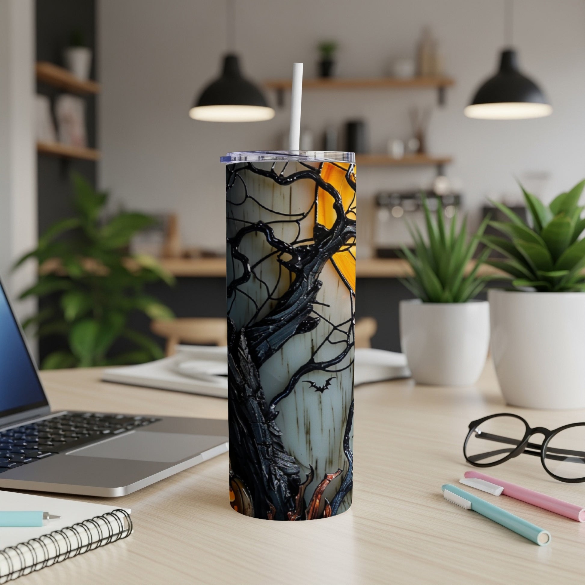 Halloween themed tumbler with spooky tree and moon design.