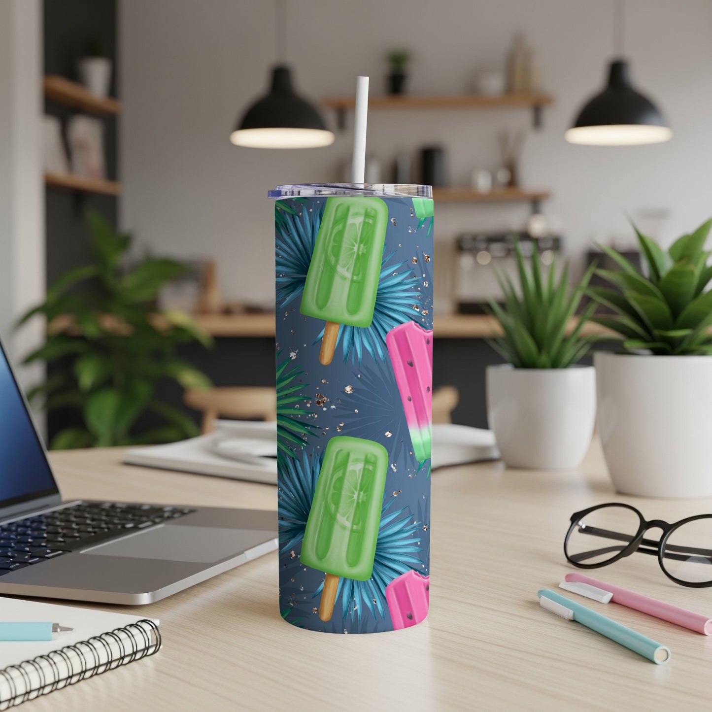 Green and pink popsicle pattern on a tall tumbler cup.