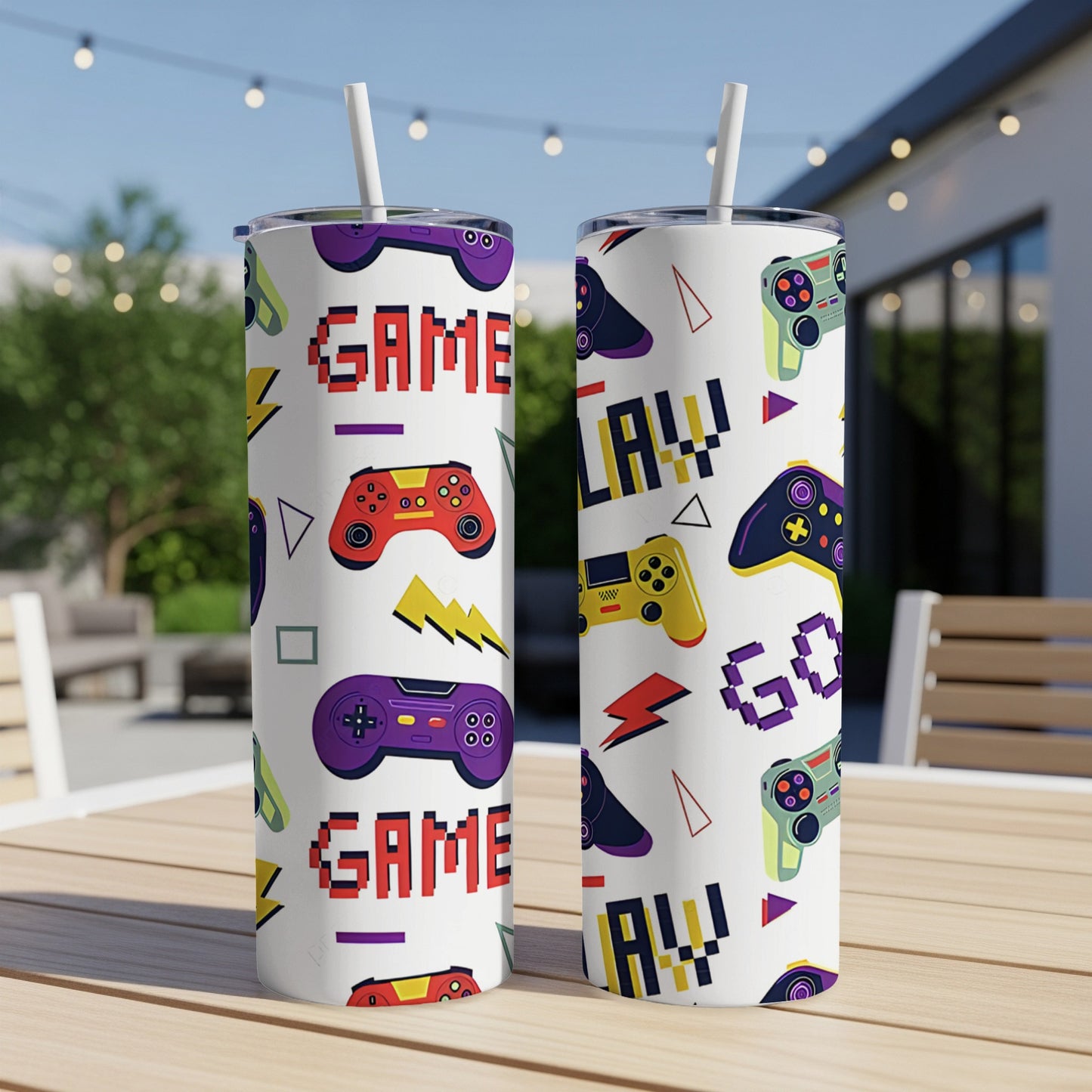 Two tumblers with a video game controller and "GAME PLAY" pattern.