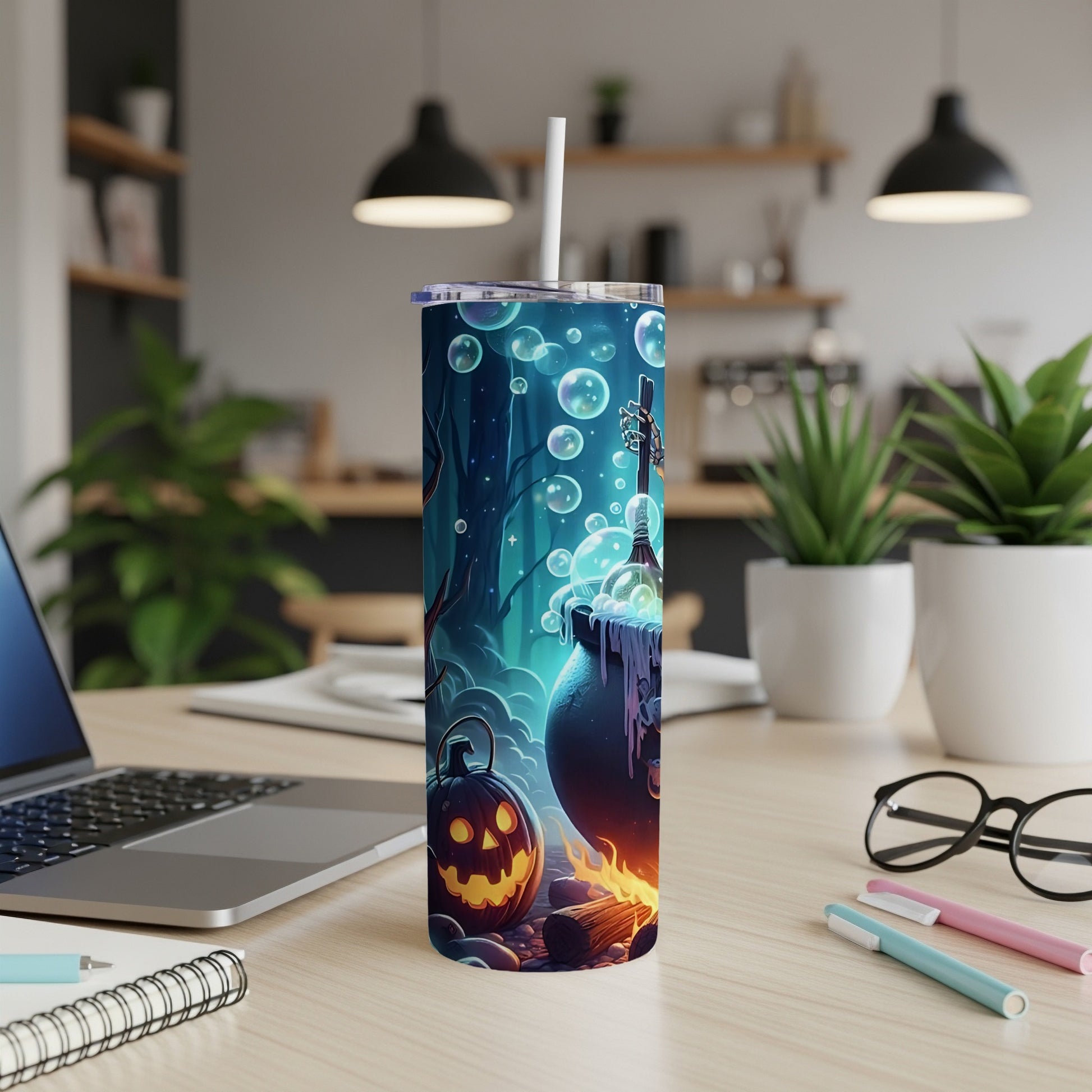 Tall tumbler with Halloween cauldron, pumpkin, and bubbles design.