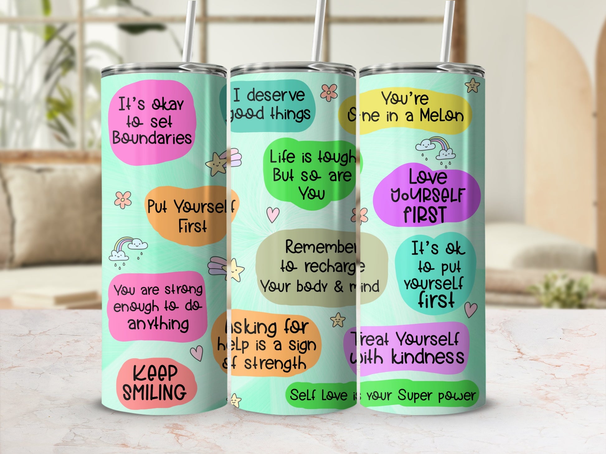 Three tumblers with inspirational quotes about self-love and boundaries.