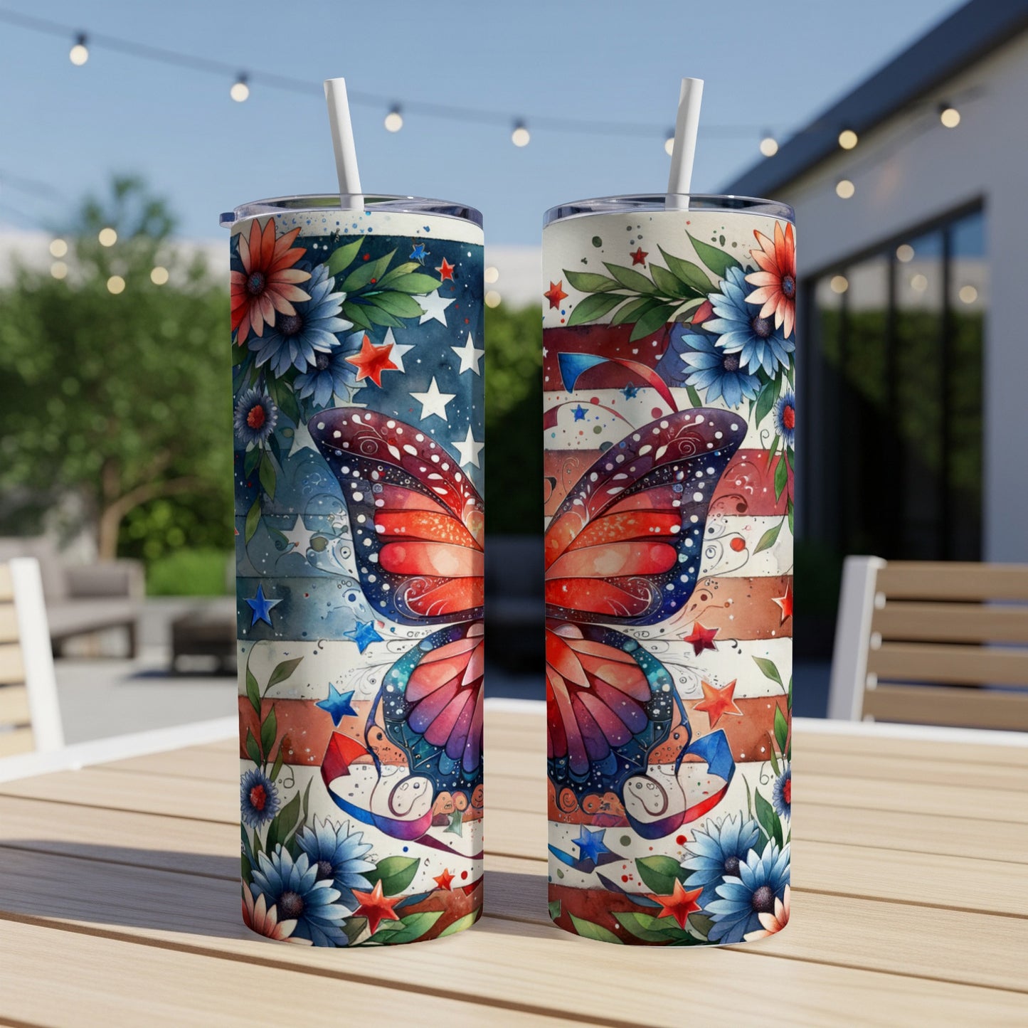 Two patriotic tumblers with butterfly wings and floral designs.