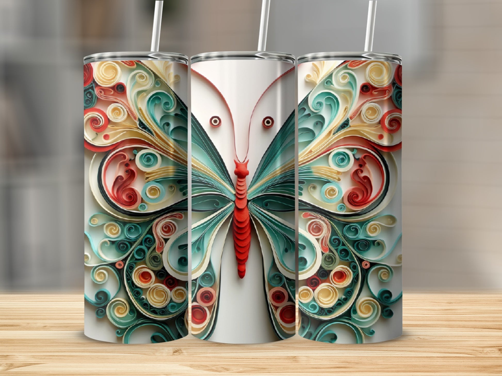 Three tumblers featuring colorful quilled paper butterfly designs.