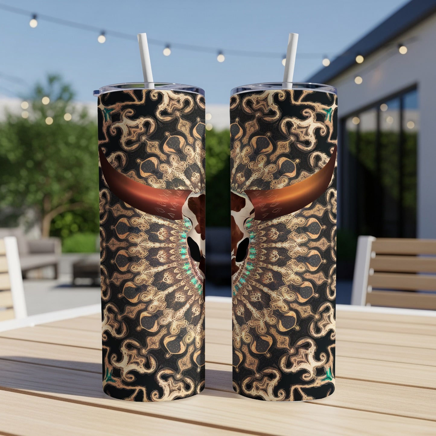 Two tall tumblers with a bull skull and ornate mandala design.