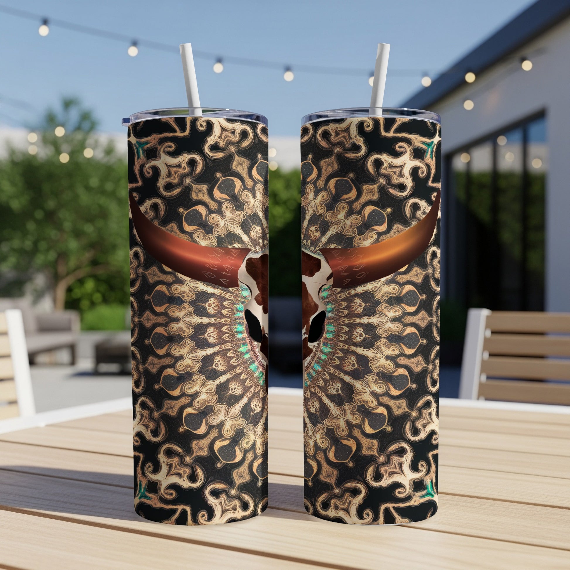 Two tall tumblers with a bull skull and ornate mandala design.