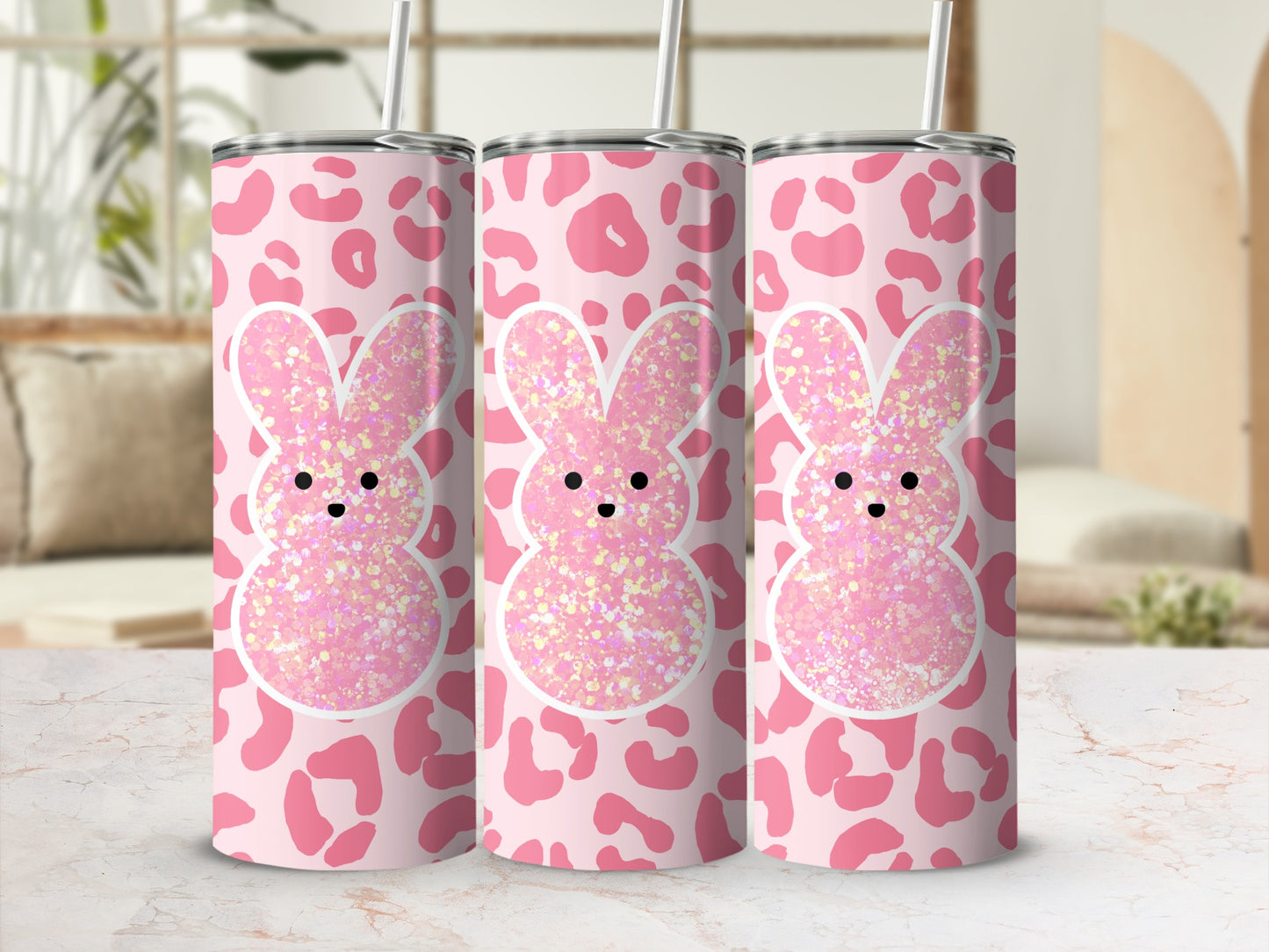 Pink leopard print tumbler with glitter bunny ears and eyes.
