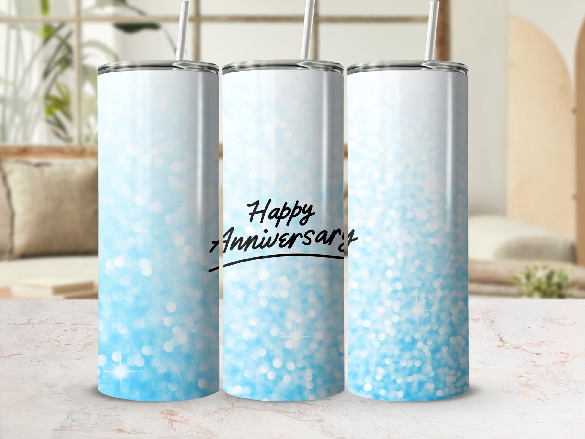 Three blue glitter tumblers with "Happy Anniversary" text.