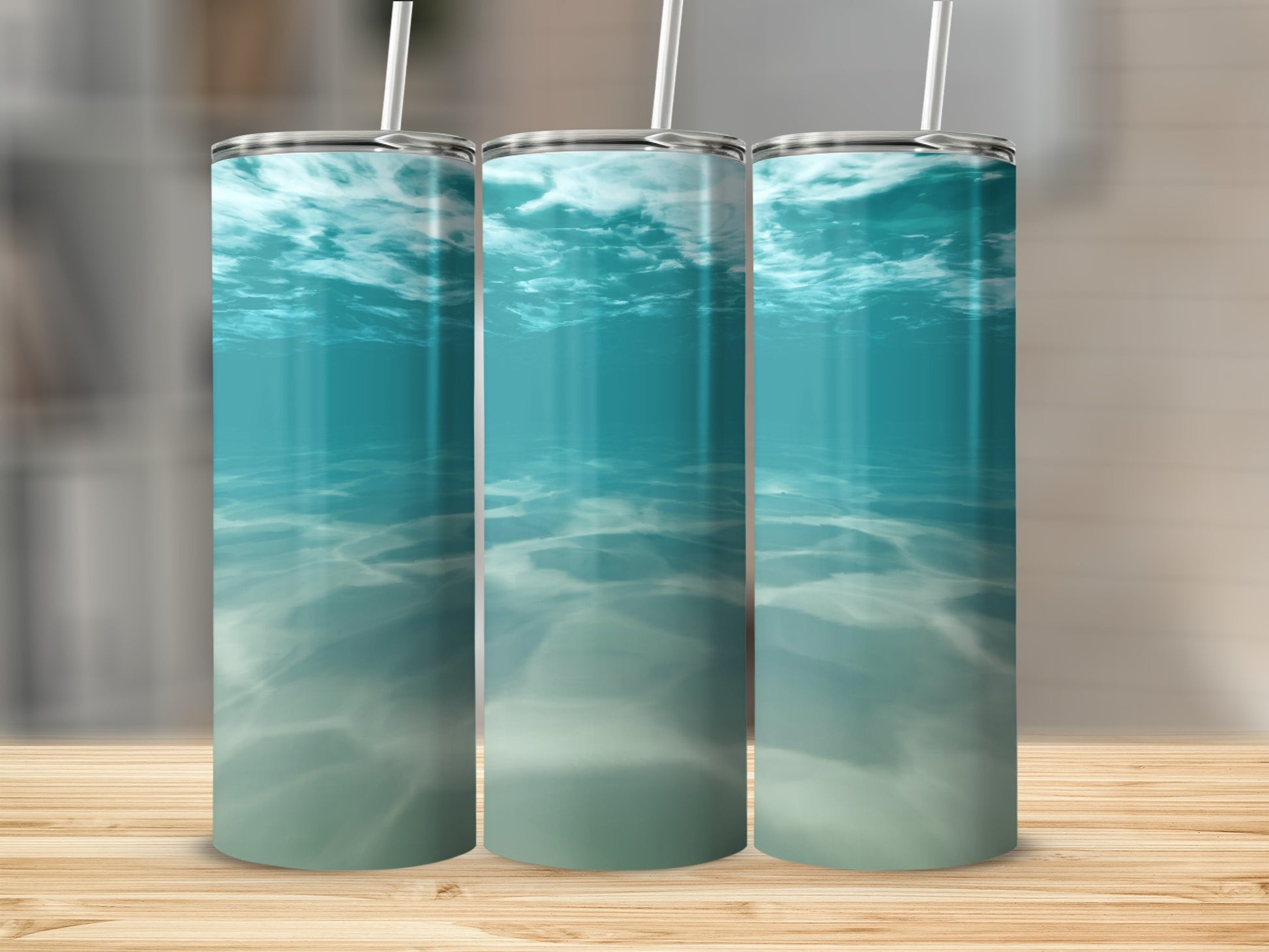 Three tumblers with underwater ocean scene.