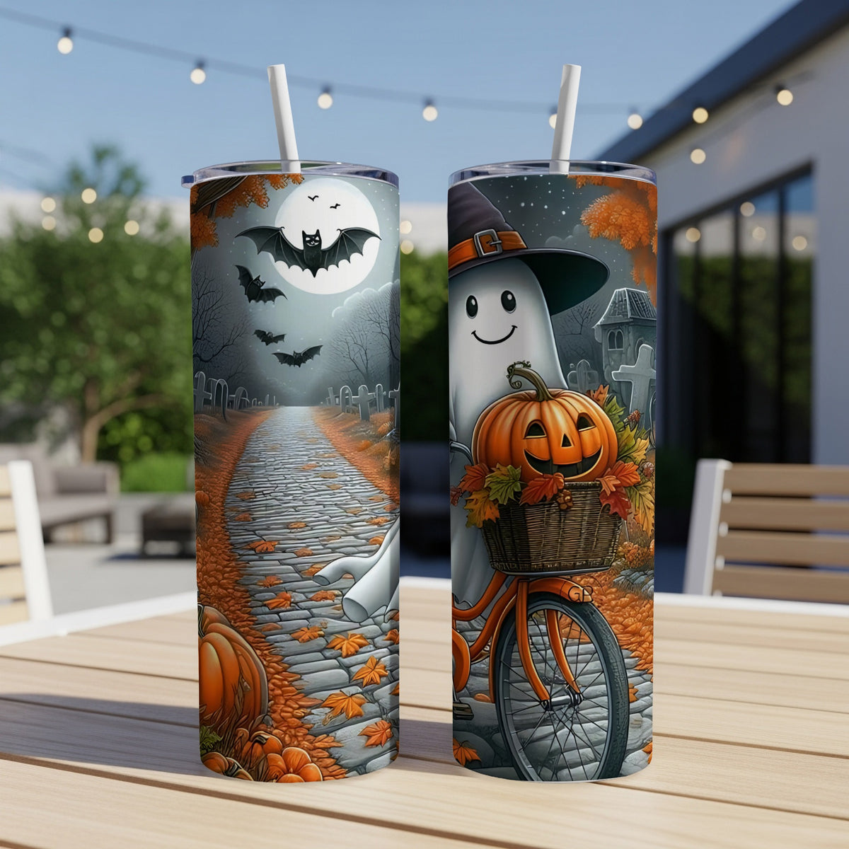 Two Halloween-themed tumblers with ghosts, pumpkins, bats, and fall leaves.