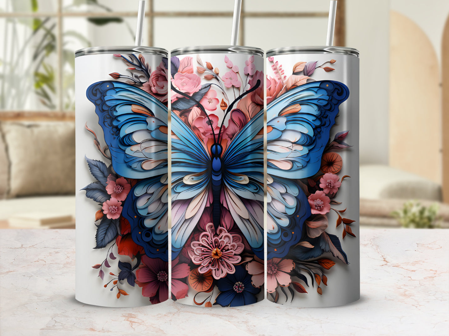 Three tumblers with a blue butterfly and floral design.