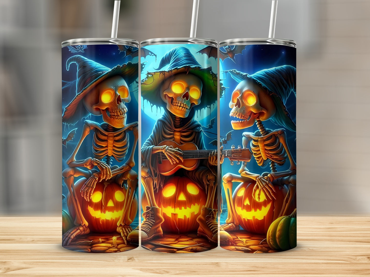 Three Halloween-themed tumblers show skeletons playing guitar on pumpkins under a moonlit sky.