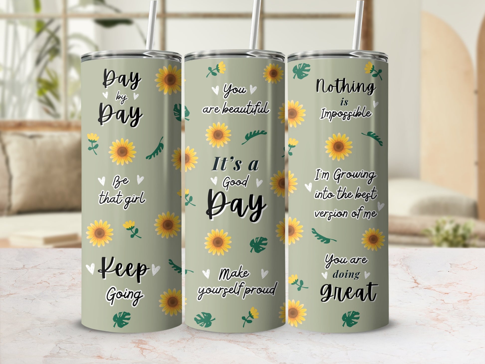 Three mint green tumblers with floral and inspirational text designs.