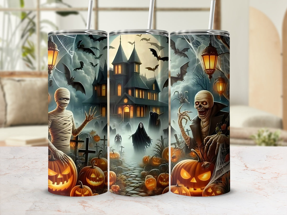 Halloween tumbler with mummy, skeleton, ghosts, haunted house, bats, and pumpkins.