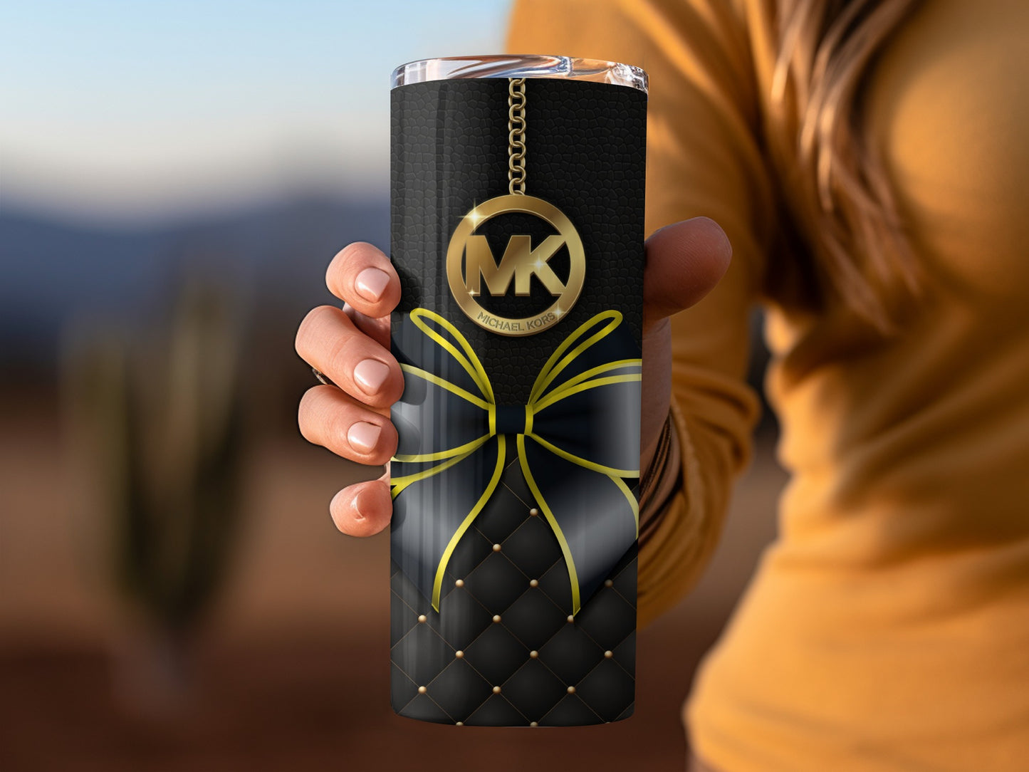 MK Branded Black and Gold Tumbler with Bow Design