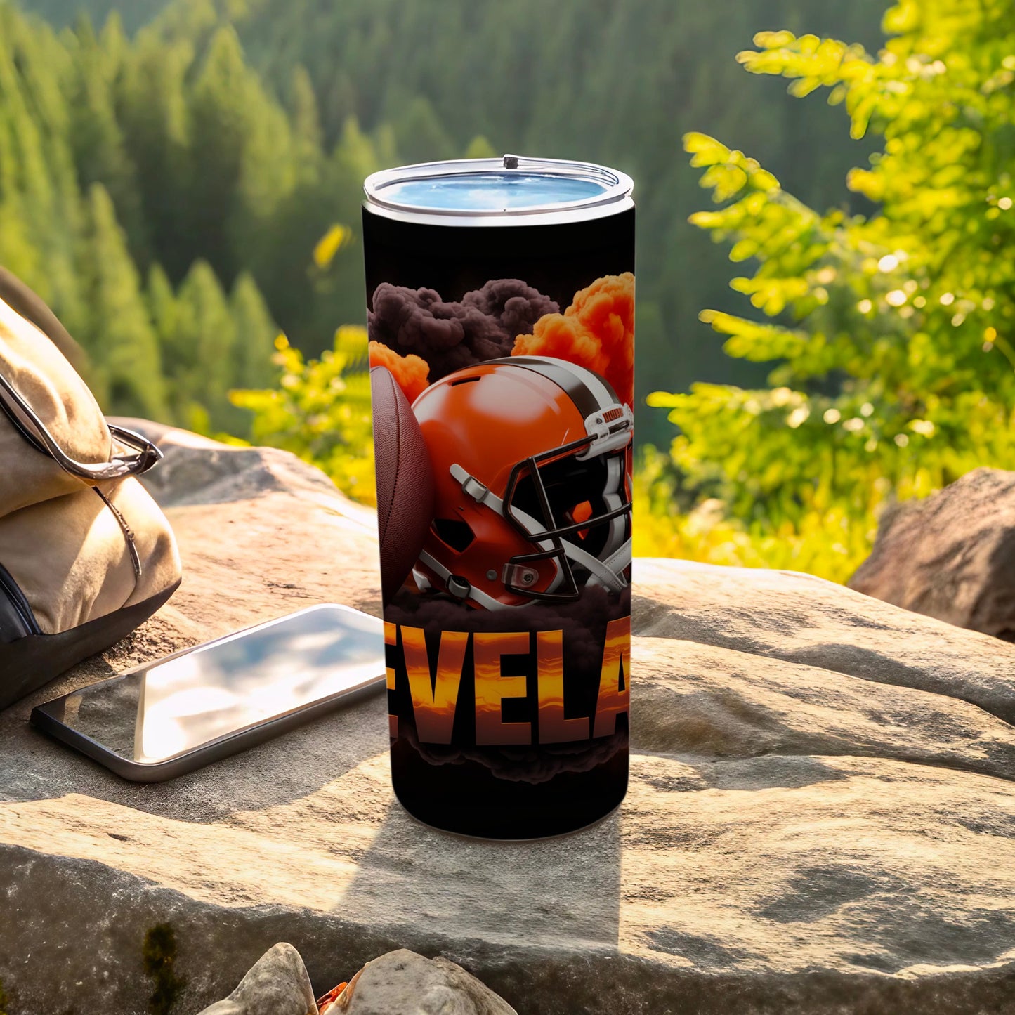 Cleveland Browns helmet and football graphic on a black tumbler.