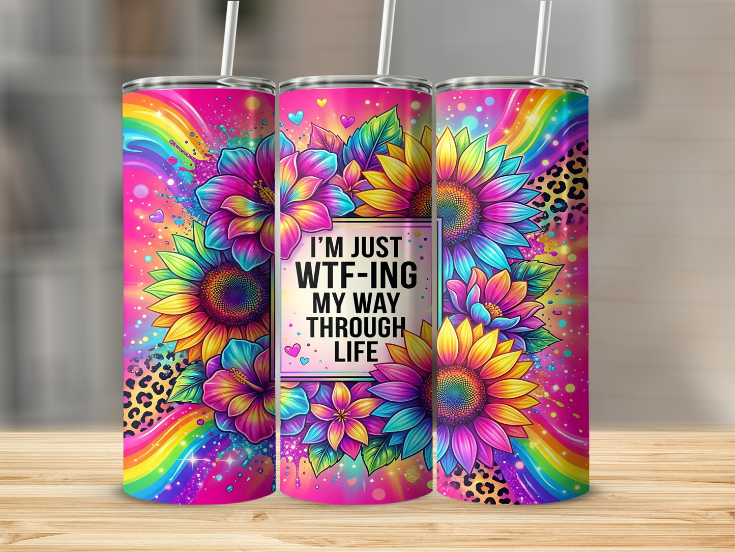 Colorful tumbler with sunflowers, leopard print, and "I'm Just WTF-ing My Way Through Life" text.