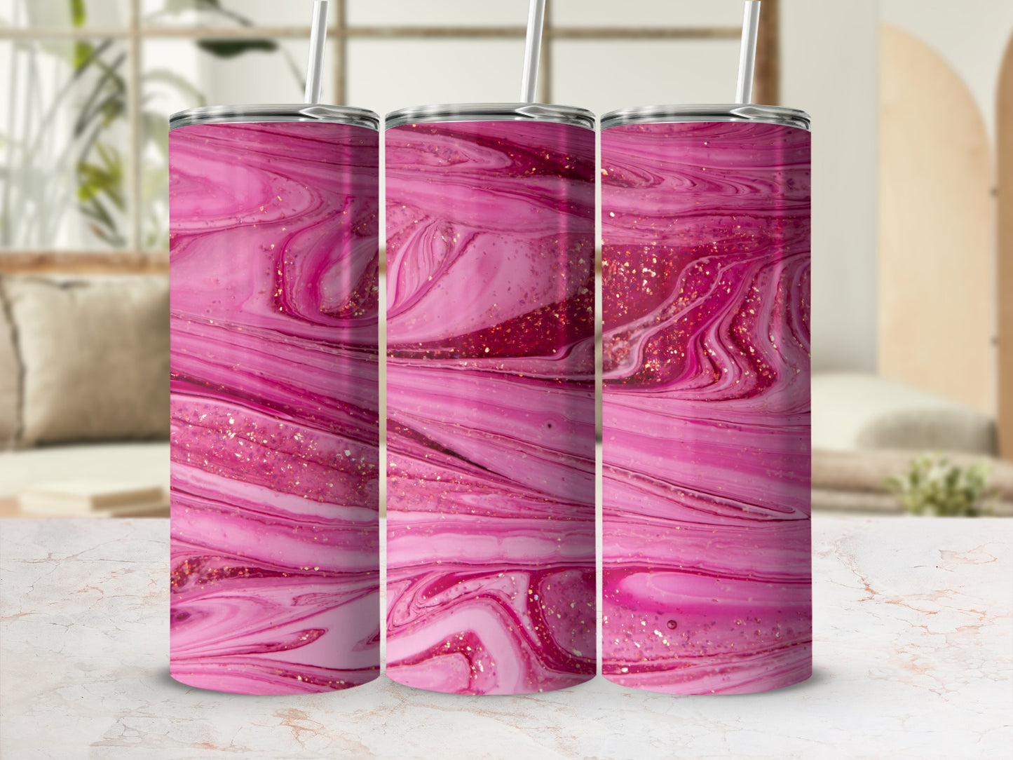 Pink and gold glitter marble pattern on a skinny tumbler.