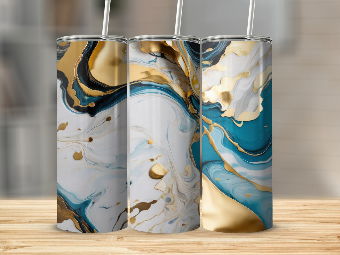 Three tall tumblers with abstract blue and gold marbled patterns.