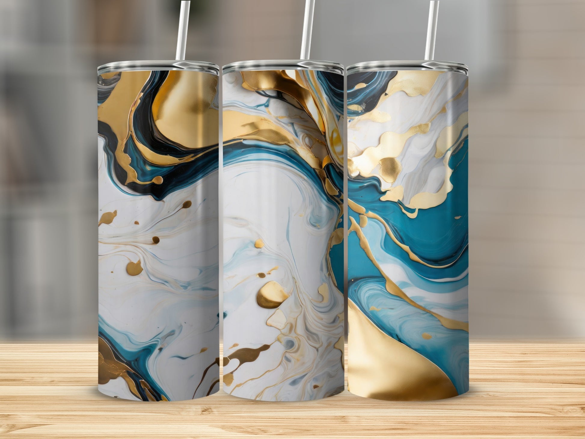 Three tall tumblers with abstract blue and gold marbled patterns.