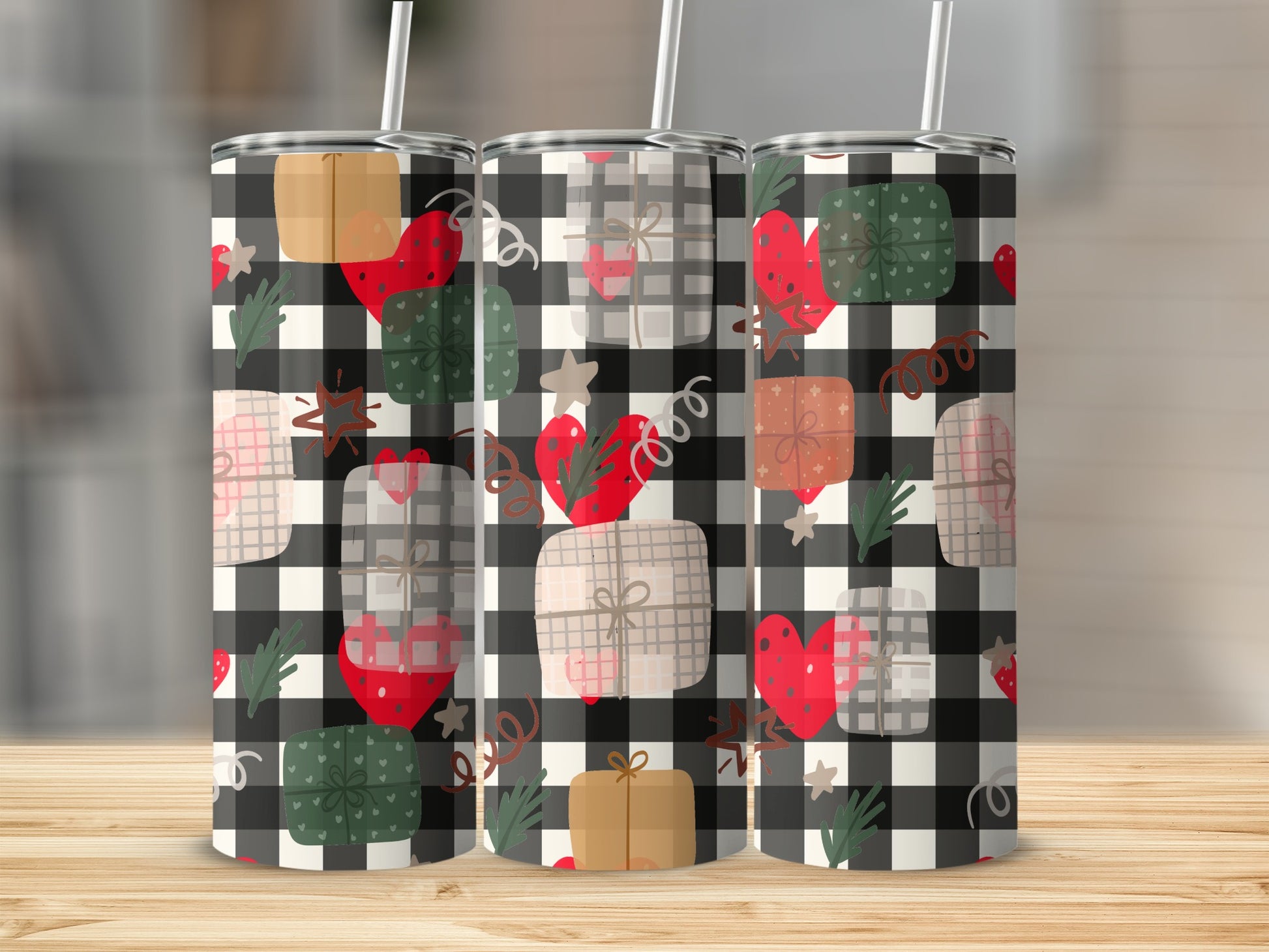 Three tumblers with a black and white buffalo check pattern and gift box design.